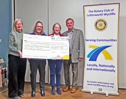 Presentation of the cheque to Kerry Laurie of Rainbows